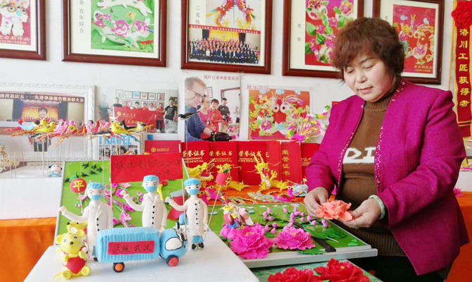 非遗传承人涂永红：剪刀红纸讴歌“战疫”英雄