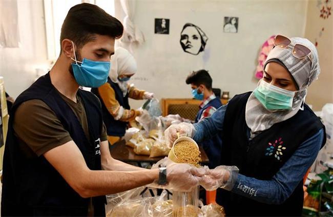 疫情中，那抹笑容最难忘——记向困难家庭发放爱心包裹的叙利亚青年志愿者