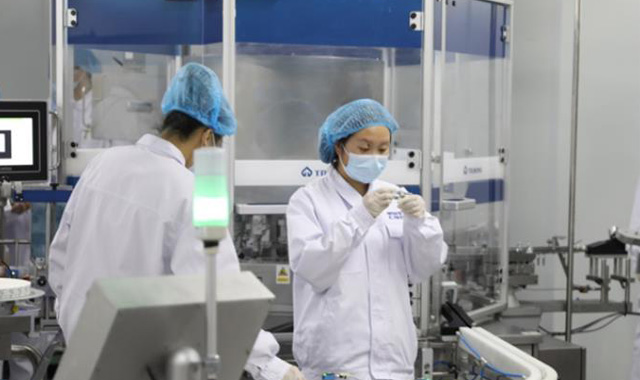 直击北京新冠疫苗生产现场：工人三班倒 车间24小时运转