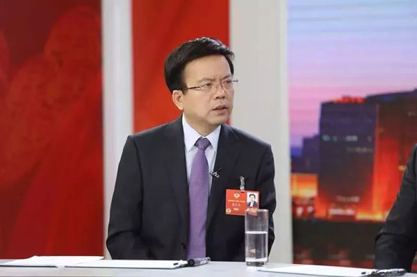 全国政协委员张义光：保障农民工劳动所得和社会福利