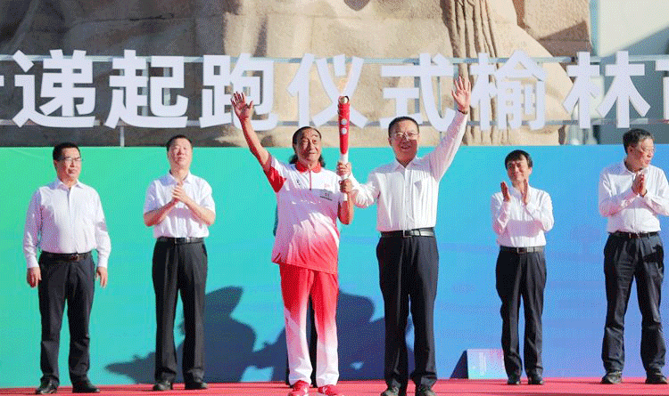 塞上古城开跑！ 十四运会和残特奥会火炬在榆林传递